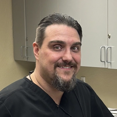 A headshot of Dr. Brian Long, a chiropractor at Barrows Chiropractic & Wellness Clinic